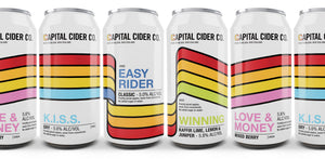 Line-up of all four of our ciders against a white background; K.I.S.S., Easy Rider, Winning and Love & Money.